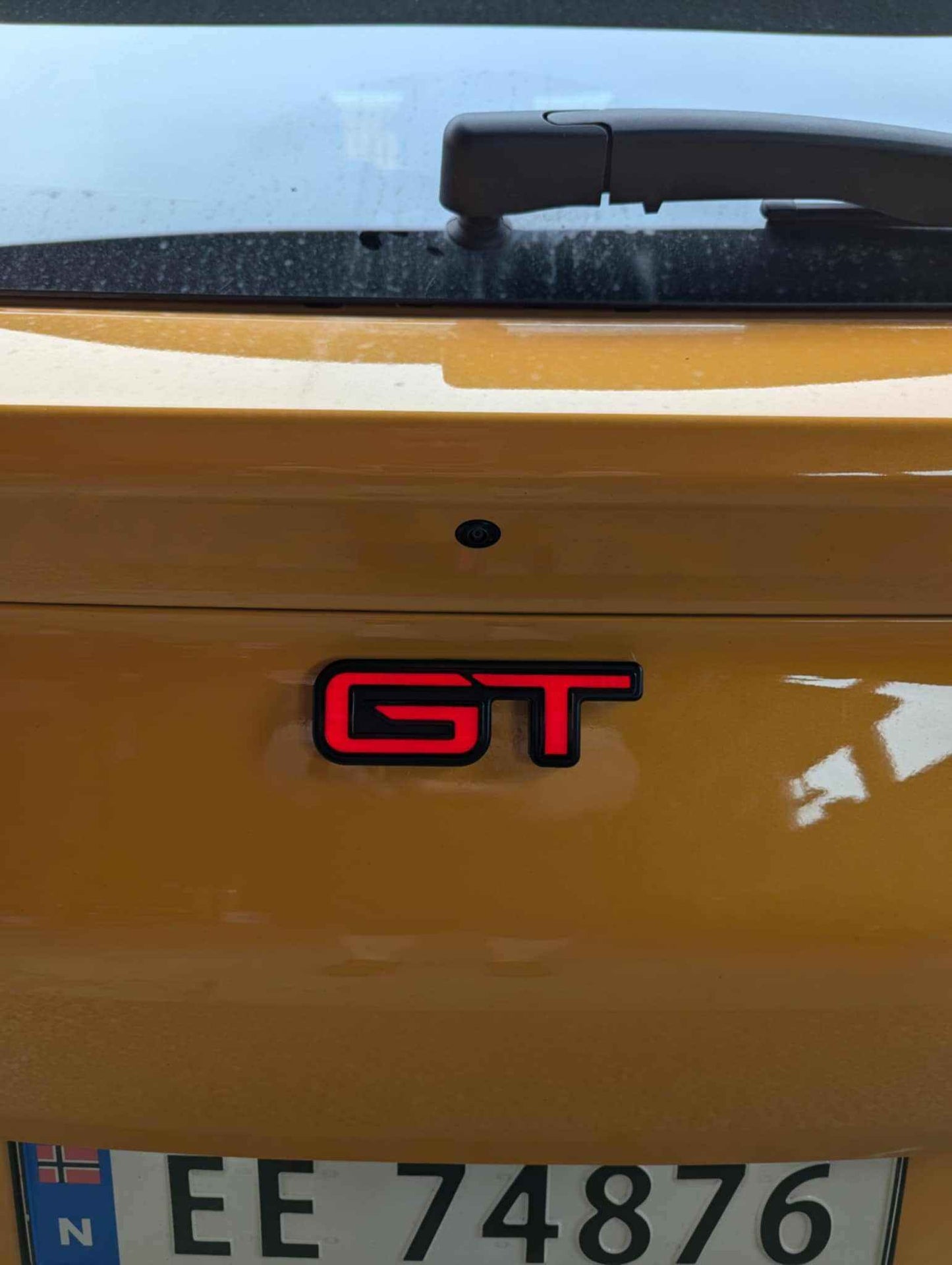 ULTIMATE LIGHT-UP GT LOGO lit in red on Mustang Mach-E rear panel