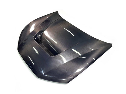 Shelby Style Fiber Hood for Mustang Mach-E 2021-2025 in wet carbon fiber with aerodynamic design and glossy finish