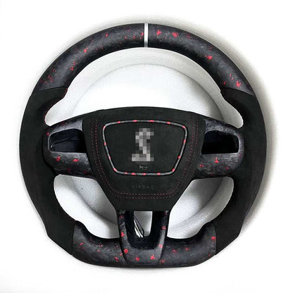 Custom made steering wheel for Mustang Mach-E with flat-bottom design, Alcantara grip, red stitching, and carbon fiber accents