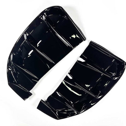 Rear Diffuser for Mustang Mach-E made of glossy black wet carbon fiber with aerodynamic design.