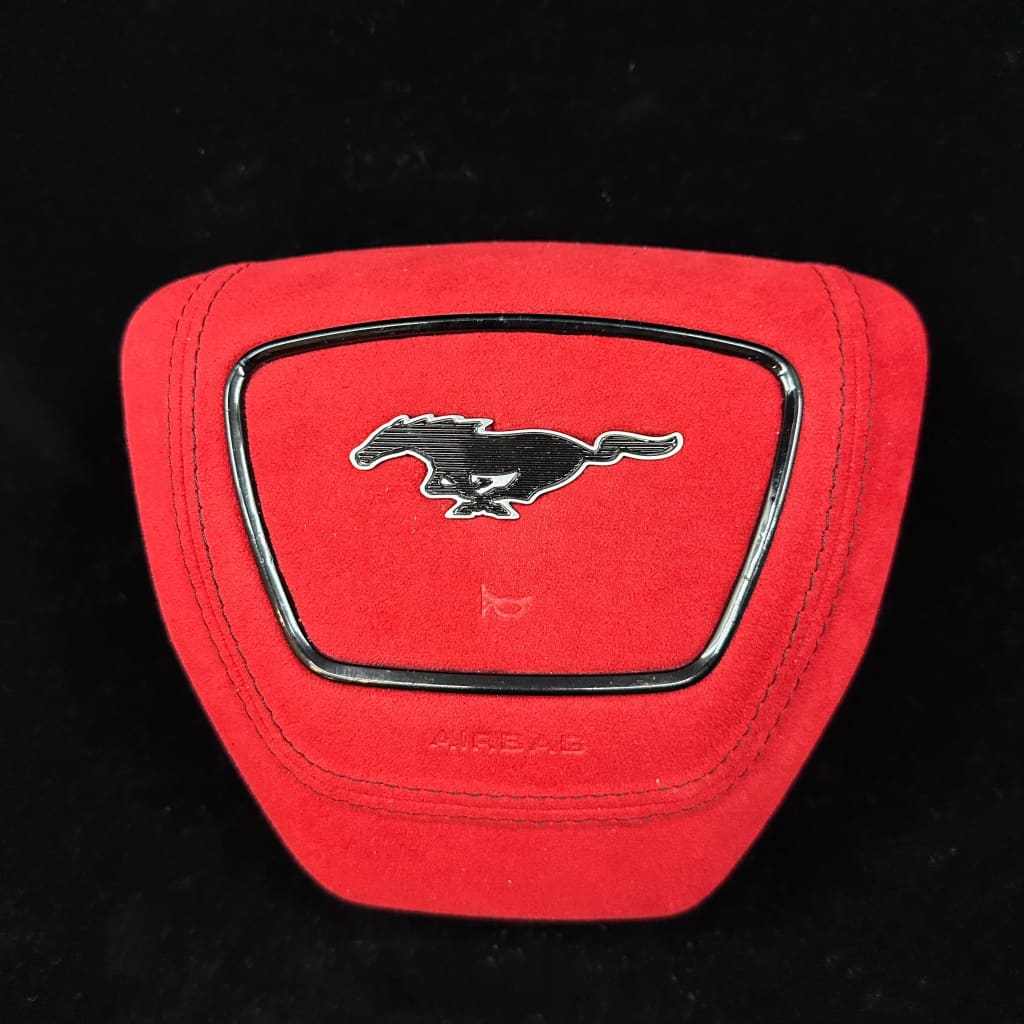 Ford center airbag for Mustang Mach-E with red Alcantara and black horse logo emblem