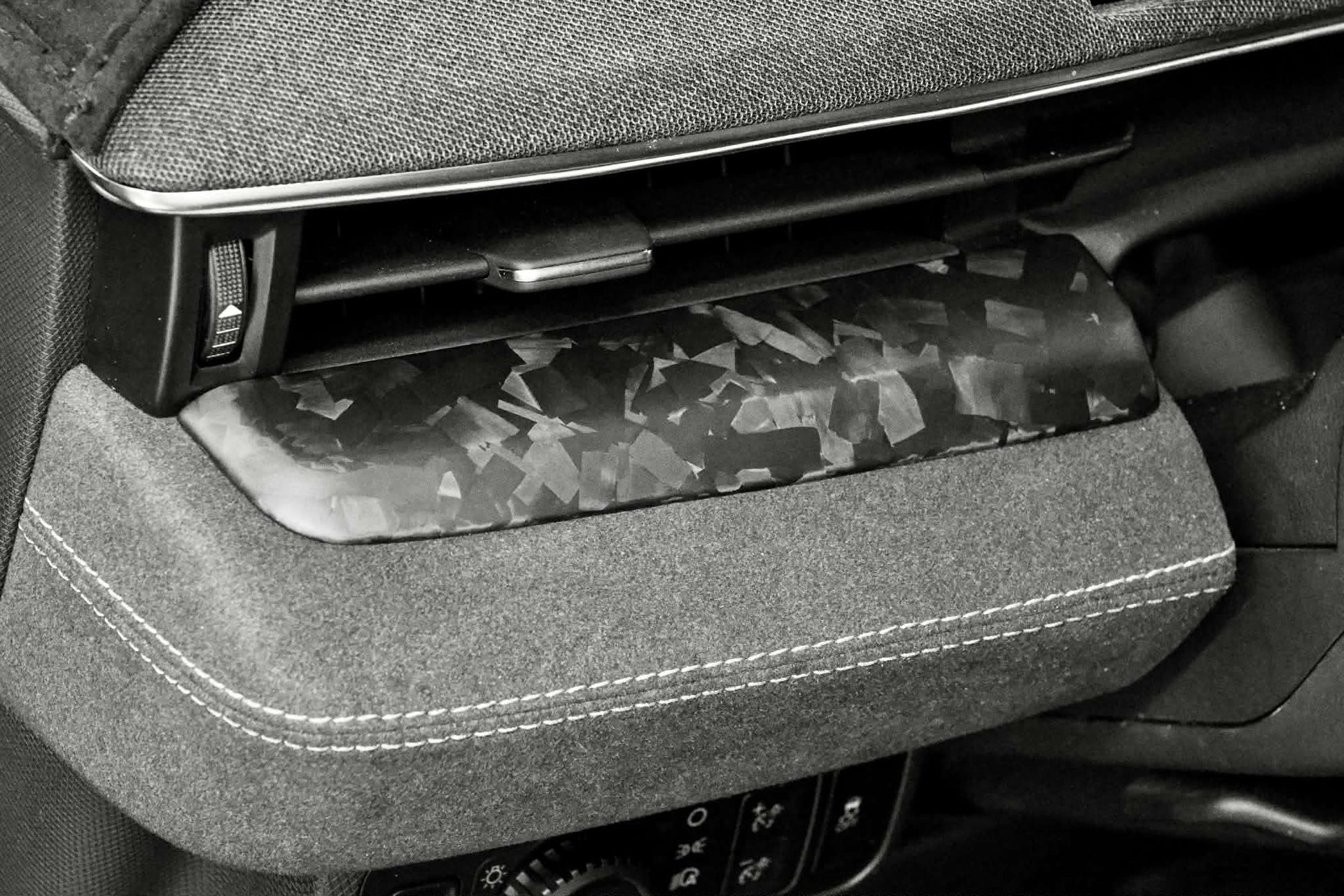 Dry carbon fiber dash panel with forged carbon finish installed in a Ford Mustang Mach-E interior