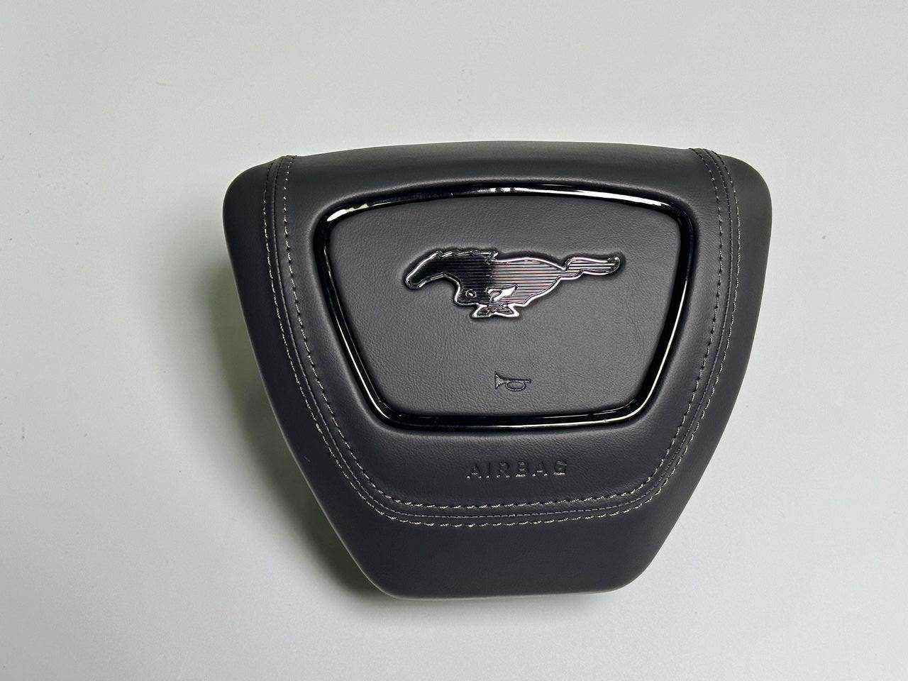 Ford Mustang Mach-E premium center airbag cover with embossed logo and LED lighting