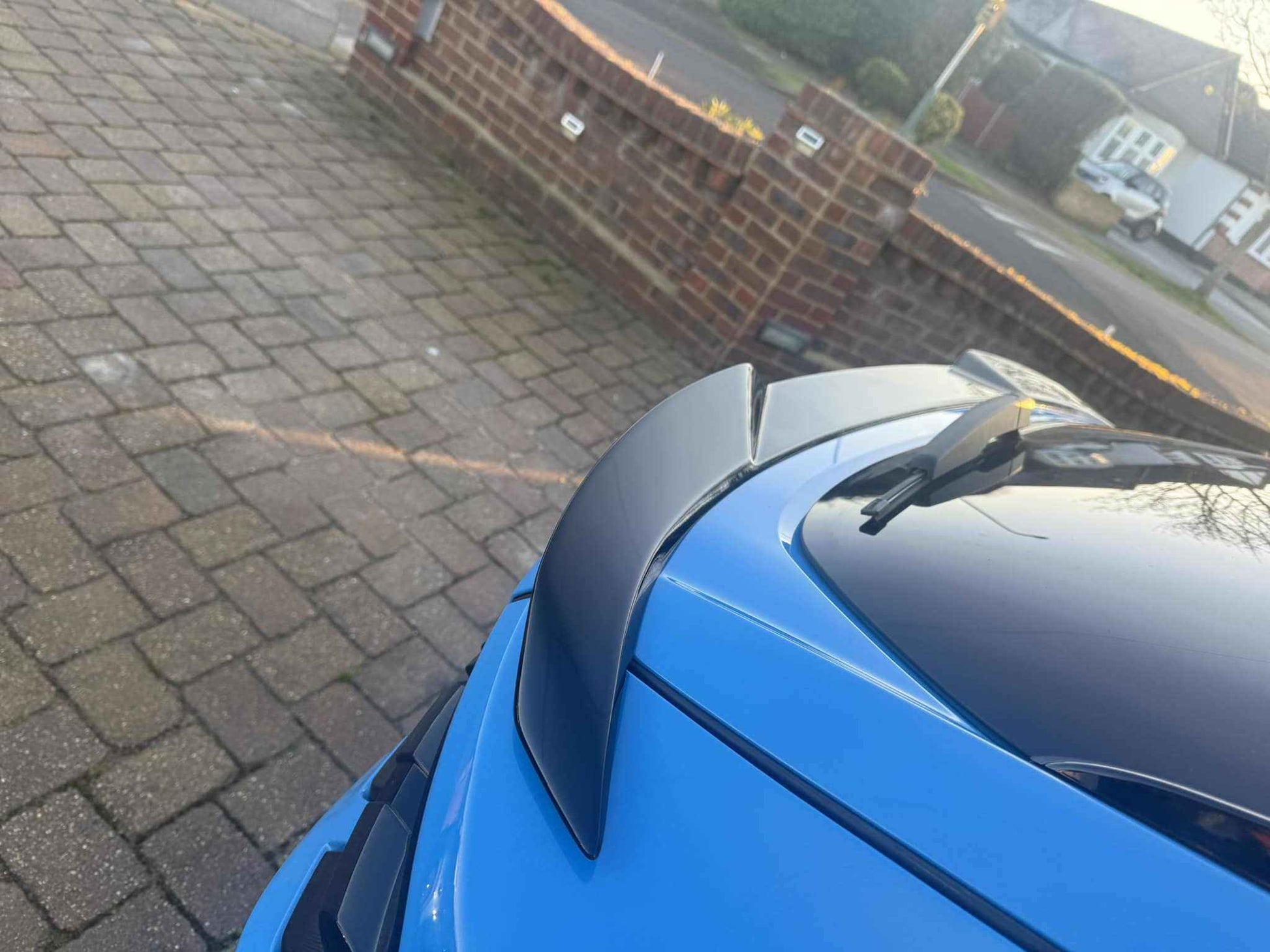 Spoiler V3 trunk spoiler on blue Mustang Mach-E (2021-2025) enhancing aerodynamics and sporty look