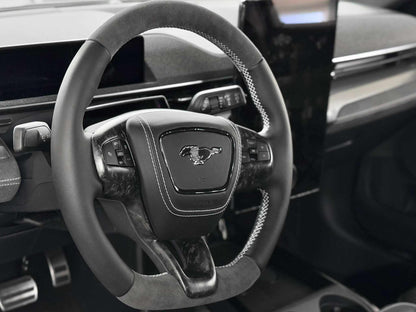 Dry Carbon Fiber Dash installed in Ford Mustang Mach-E interior showing sleek carbon fiber finish and modern dashboard design.