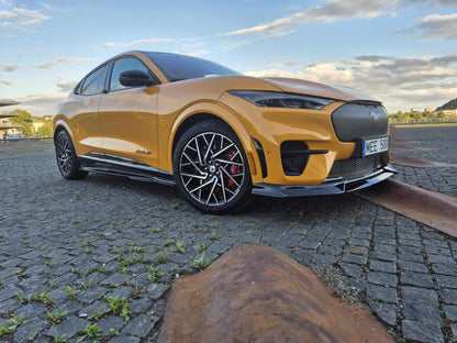 Mustang Mach-E GT with carbon fiber front lip splitter installed on yellow body