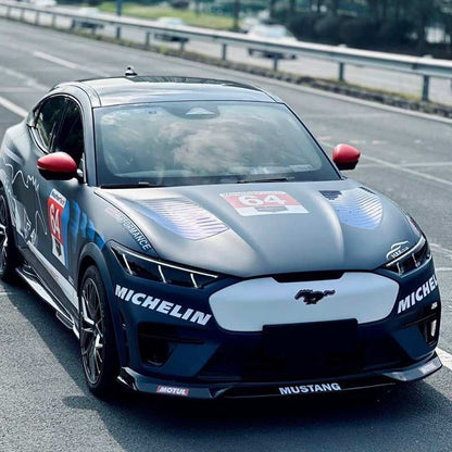 Front lip splitter on blue Mustang Mach-E GT race car with Michelin branding