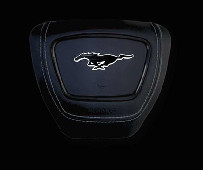 Ford Mustang Mach-E center airbag cover with LED illuminated logo and premium leather finish