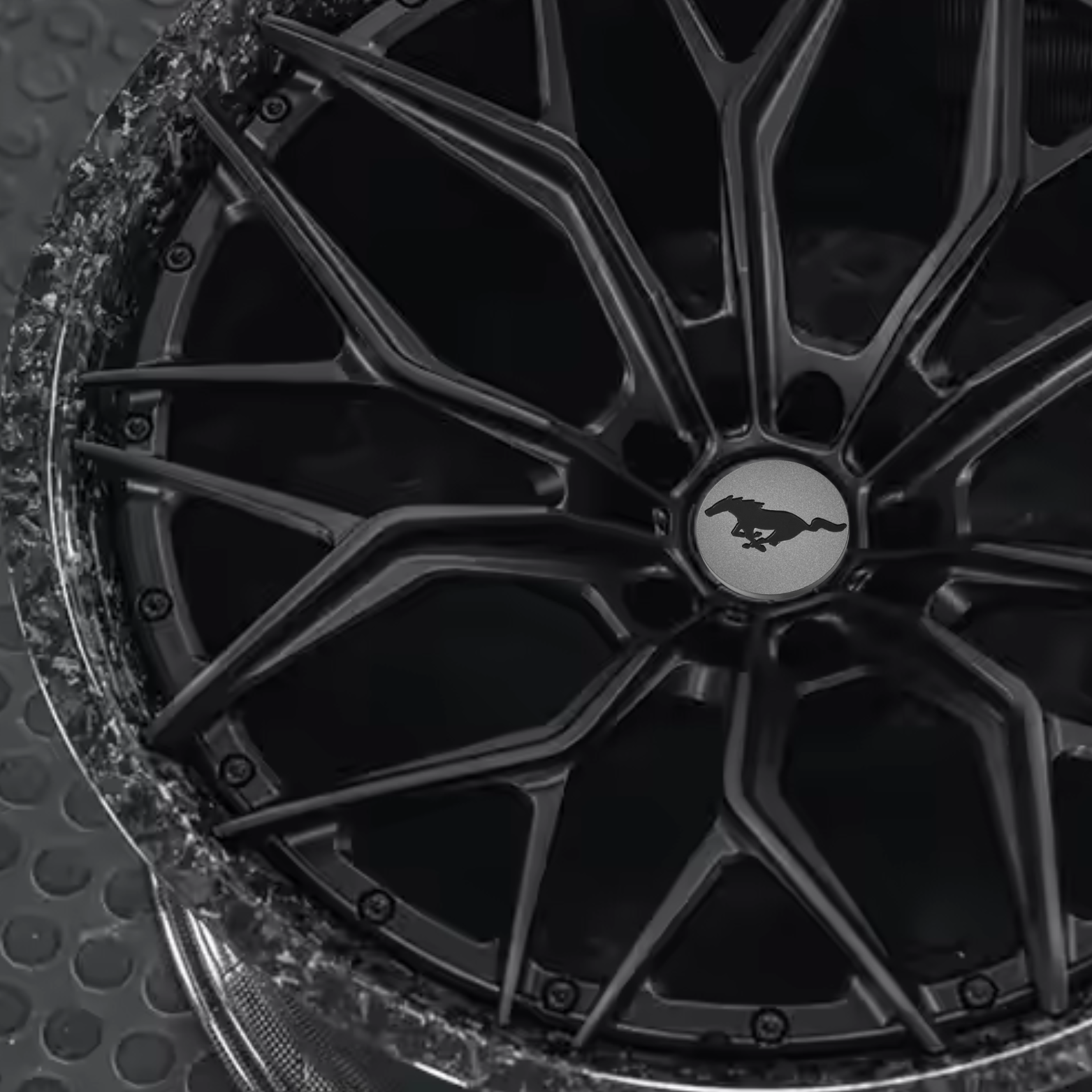 Custom forged Al6061-T6 aluminum wheel for Mustang Mach-E with Mustang emblem, sleek black design, and precision craftsmanship