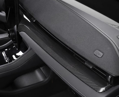 Dry carbon fiber dash panel installed in Ford Mustang Mach-E interior showing sleek black weave finish.