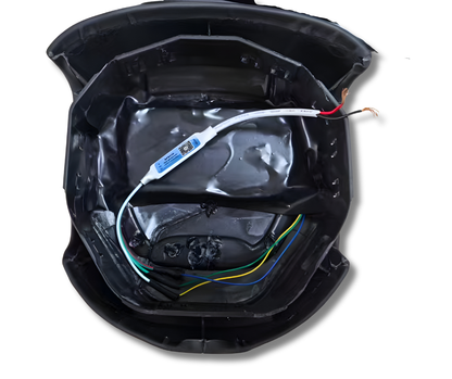 Ford Mustang Mach-E center airbag cover with LED logo and wiring harness inside