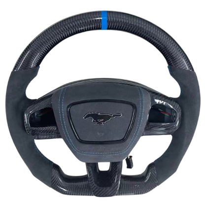Custom made carbon fiber and Alcantara steering wheel for Mustang Mach-E with blue stitching and flat bottom design