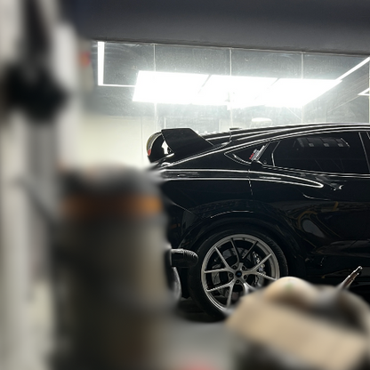 Rally Wing Spoiler on black 2021-2025 Ford Mustang Mach-E rear for improved downforce and sporty look