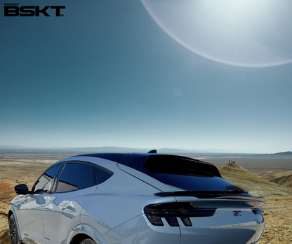 Spoiler V3 carbon fiber trunk spoiler on white Mustang Mach-E 2021-2025 in desert background