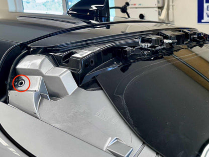 Close-up of retractable spoiler mechanism on Mustang Mach-E tailgate