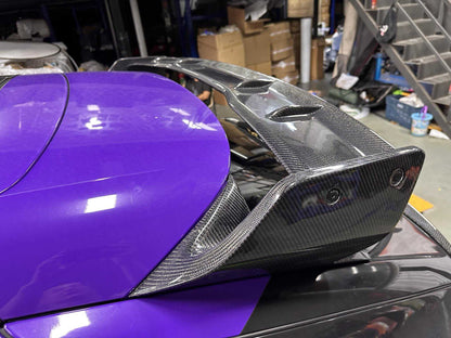 Carbon fiber Rally Wing Spoiler on purple Ford Mustang Mach-E for enhanced downforce and sporty look