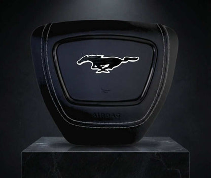 Ford Mustang Mach-E center airbag cover with LED logo and leather or Alcantara finish