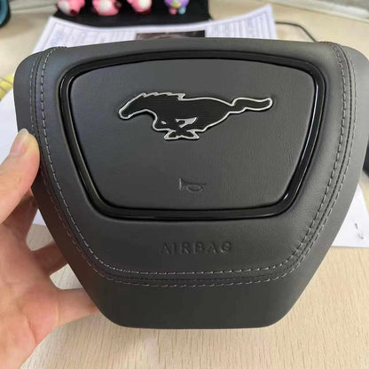 Custom made Mustang Mach-E steering wheel airbag cover with horse logo and premium leather stitching