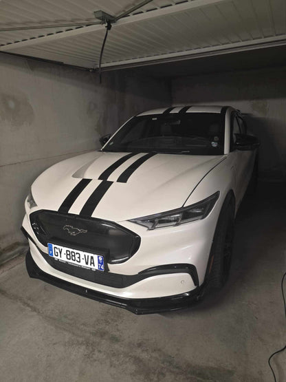 Ford Mustang Mach-E with Shelby Style Fiber Hood in a garage