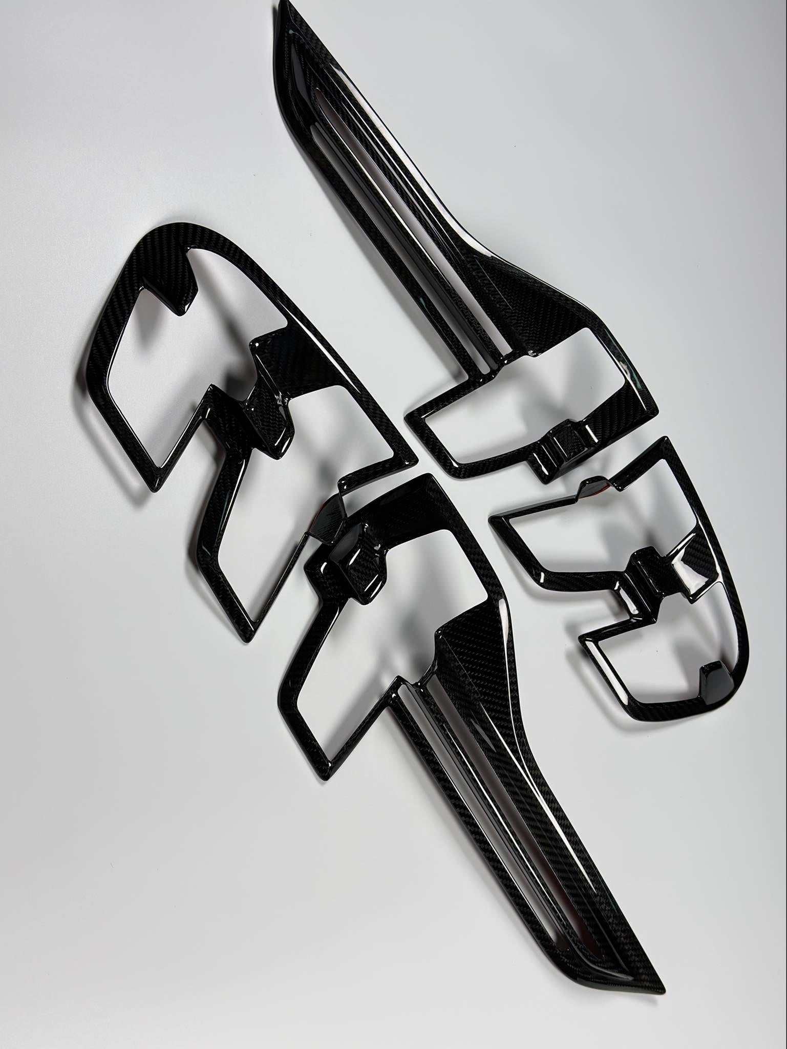 Dry carbon fiber kit for Mustang Mach-E including mirror caps, shark antenna, and rear lamp trims