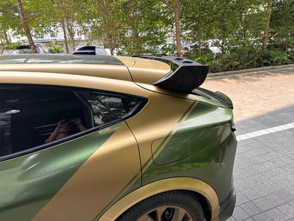 Rally Wing Spoiler on green and gold Ford Mustang Mach-E rear side view