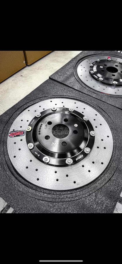 Drilled carbon ceramic disc rotors for Ford Mustang Mach-E GT with ceramic brake pads and Brembo calipers