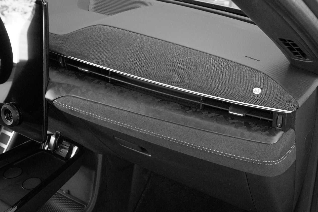 Dry Carbon Fiber Dash installed in Ford Mustang Mach-E interior, featuring lightweight, heat-resistant, and durable design with a sleek forged carbon finish.